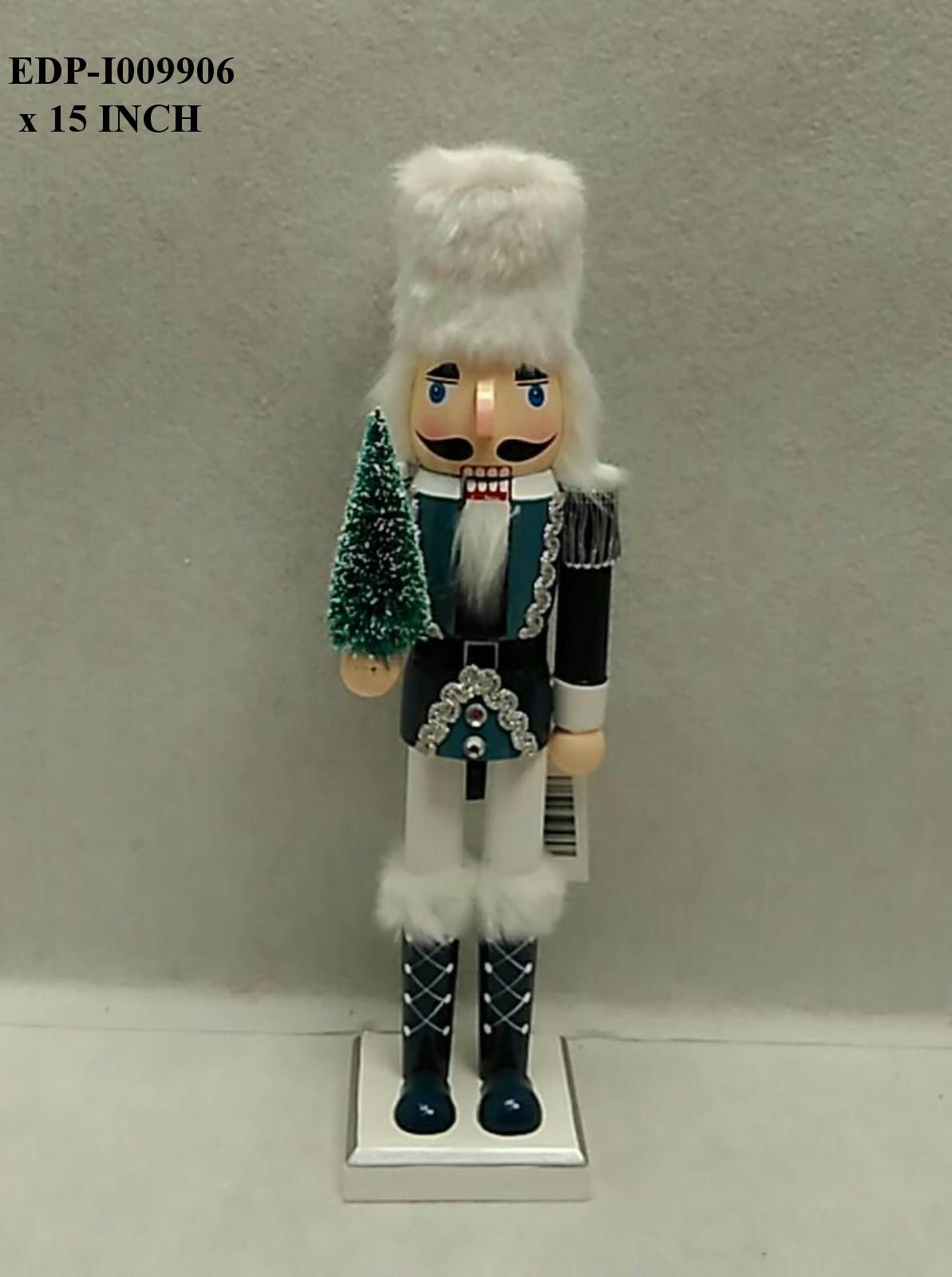 15"H. Traditional White/Green Nutcracker Holding  a Tree