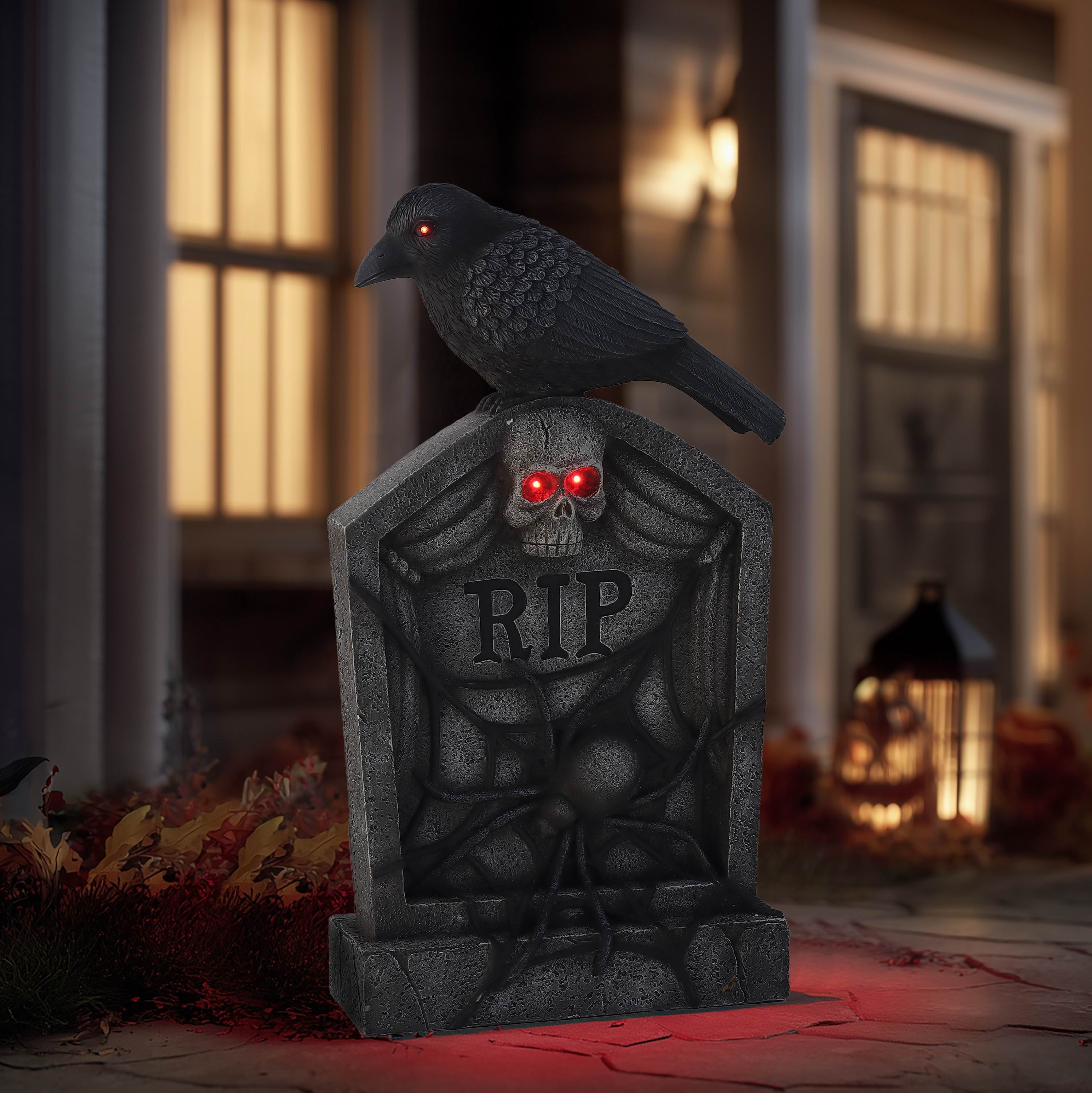 28"H. Polyresin Tombstone With Bird