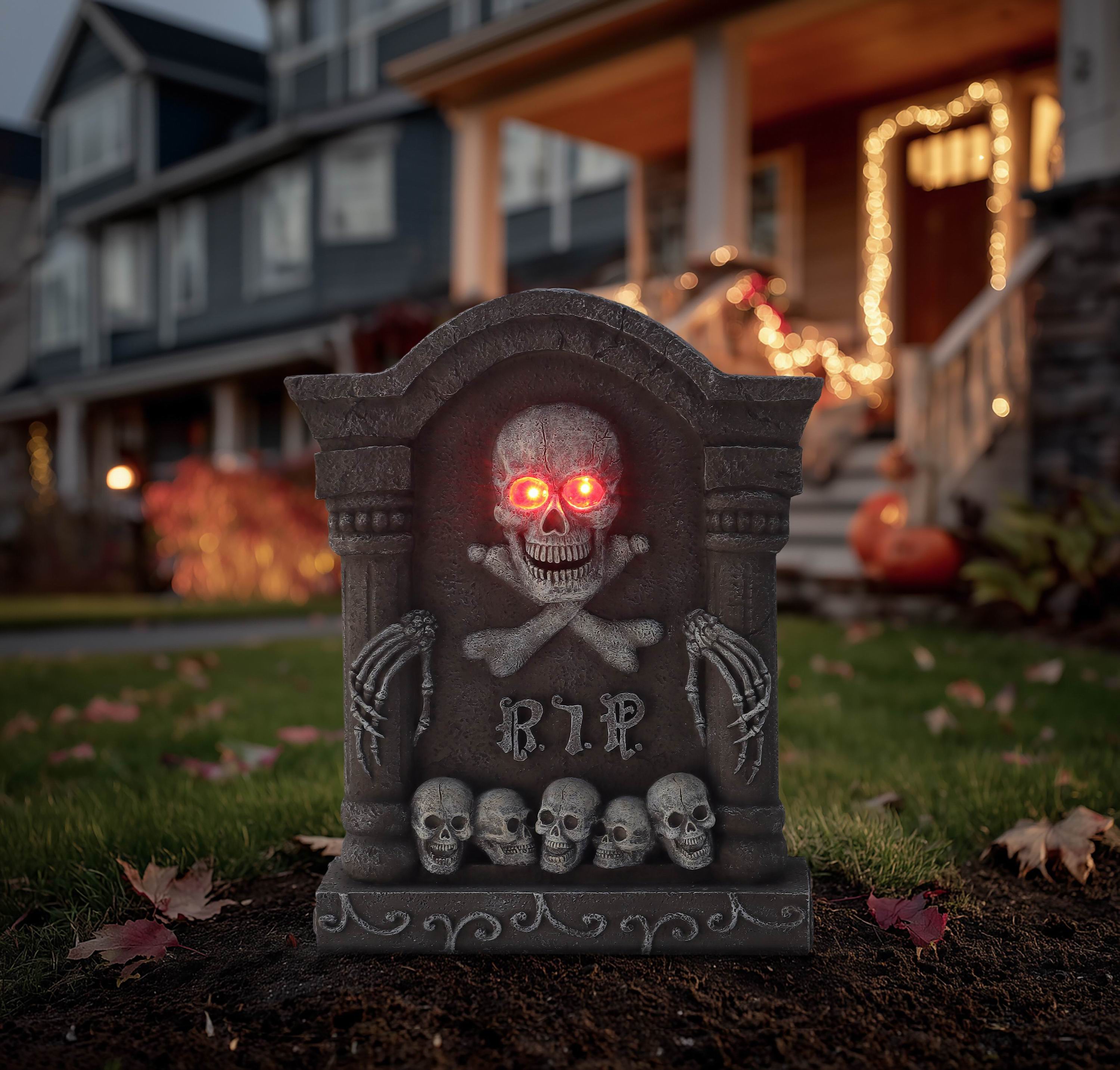 24"H. Polyresin Tombstone With Skulls