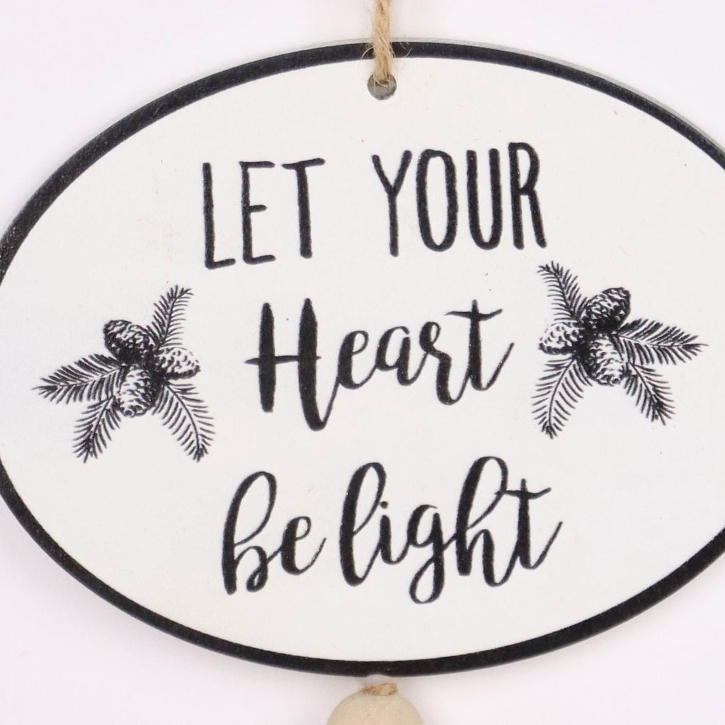 "Let your heart be light" ornament