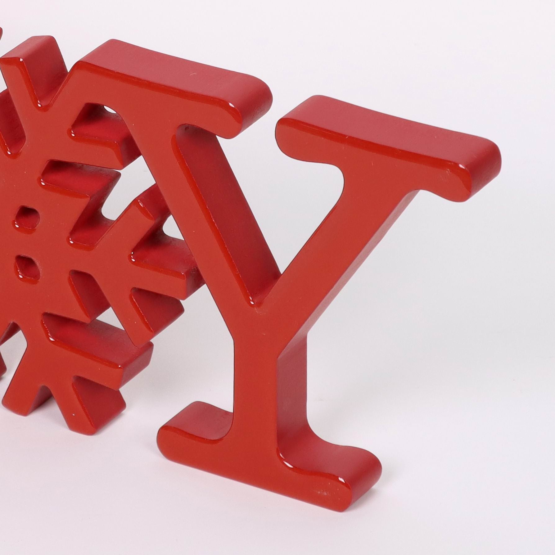 "JOY" red acrylic signage with snowflake