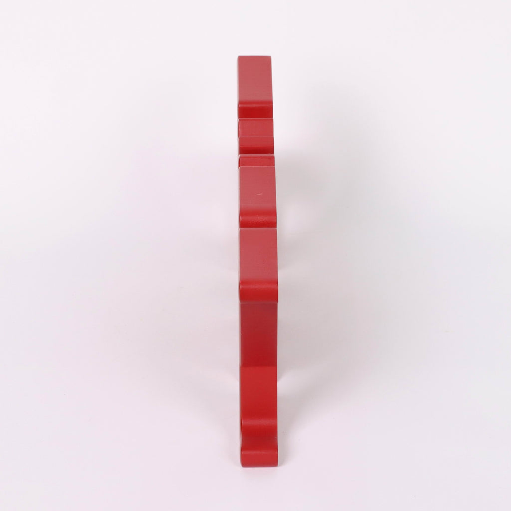"JOY" red acrylic signage with snowflake