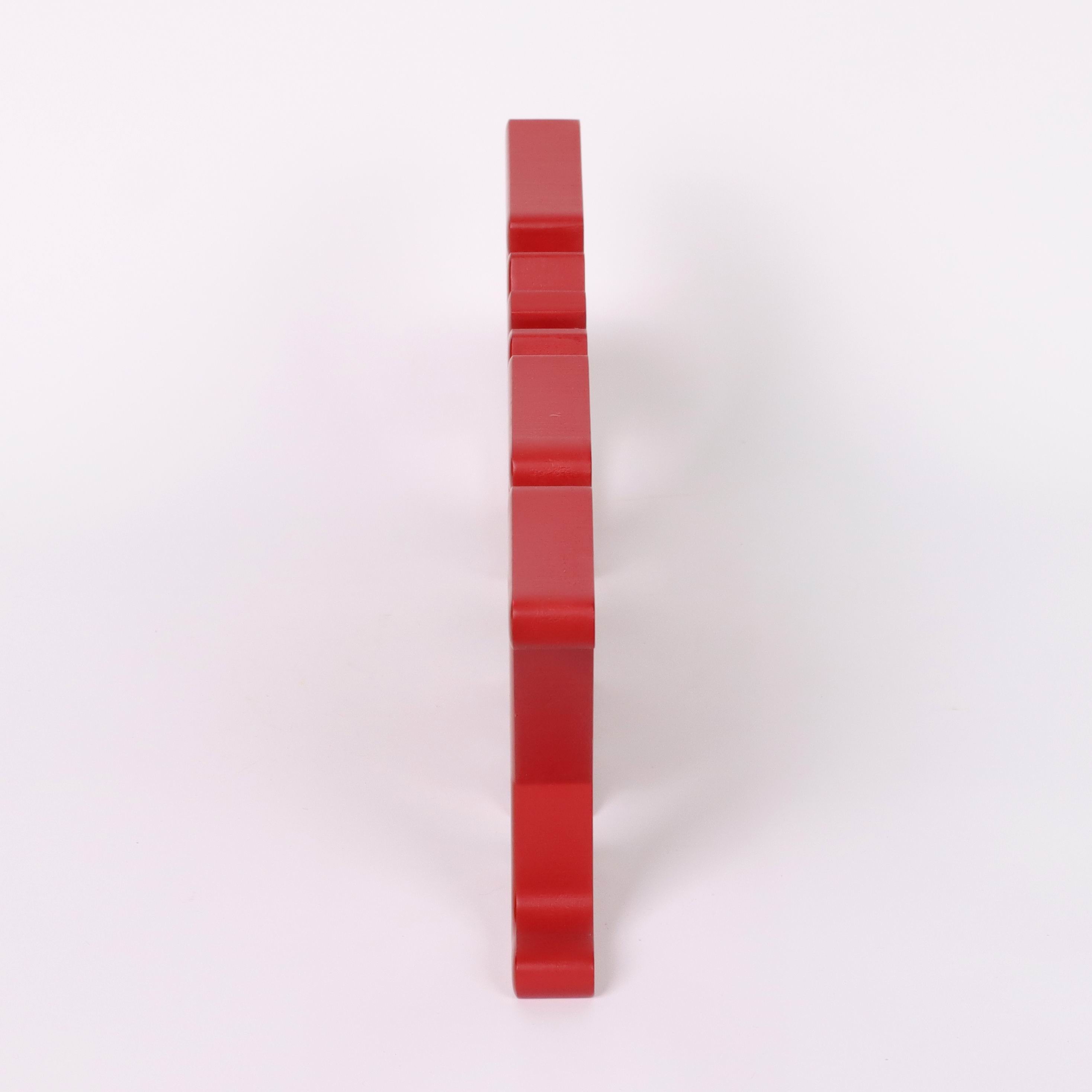 "JOY" red acrylic signage with snowflake
