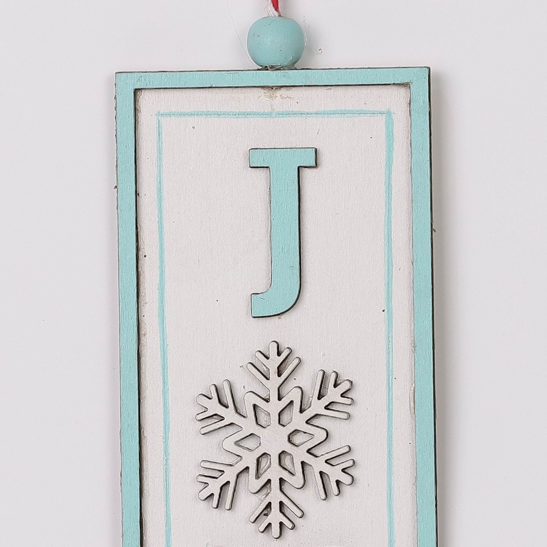 "Joy" signage ornament